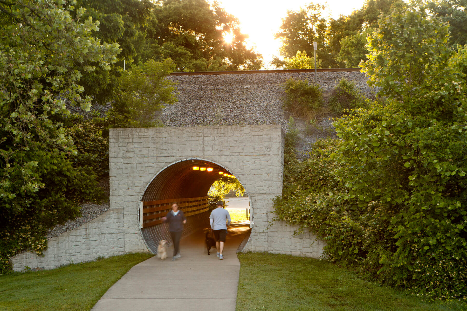 a tunnel with a walking path at Crockett Park