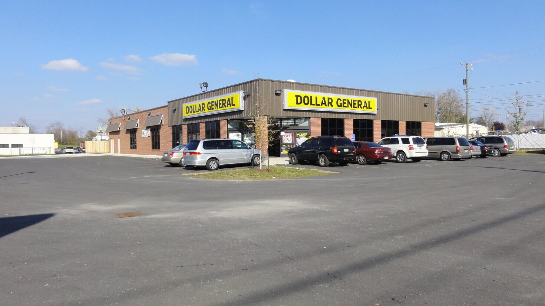 a dollar general store and parking lot