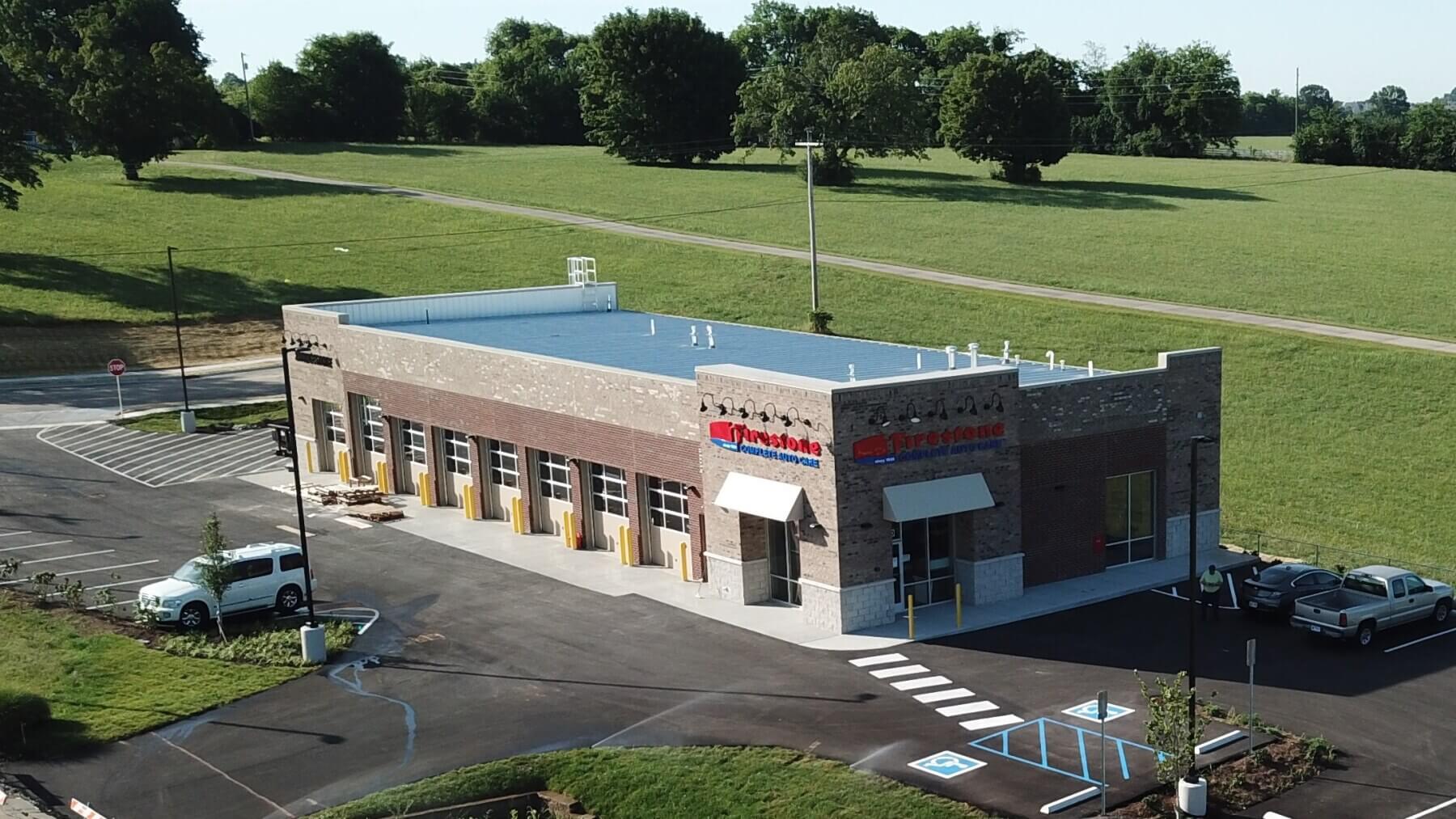 a Firestone Complete Auto Care store and parking lot