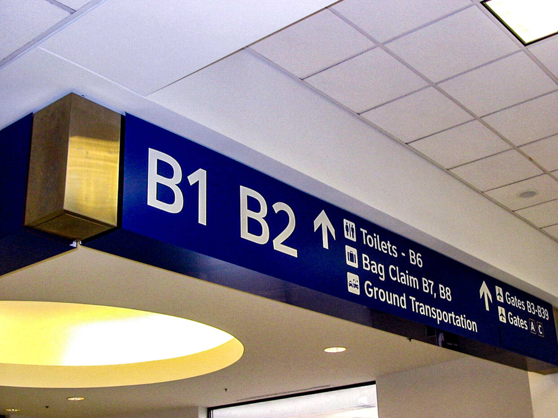 overhead signage in the concourse at Dallas/Forth Worth International Airport