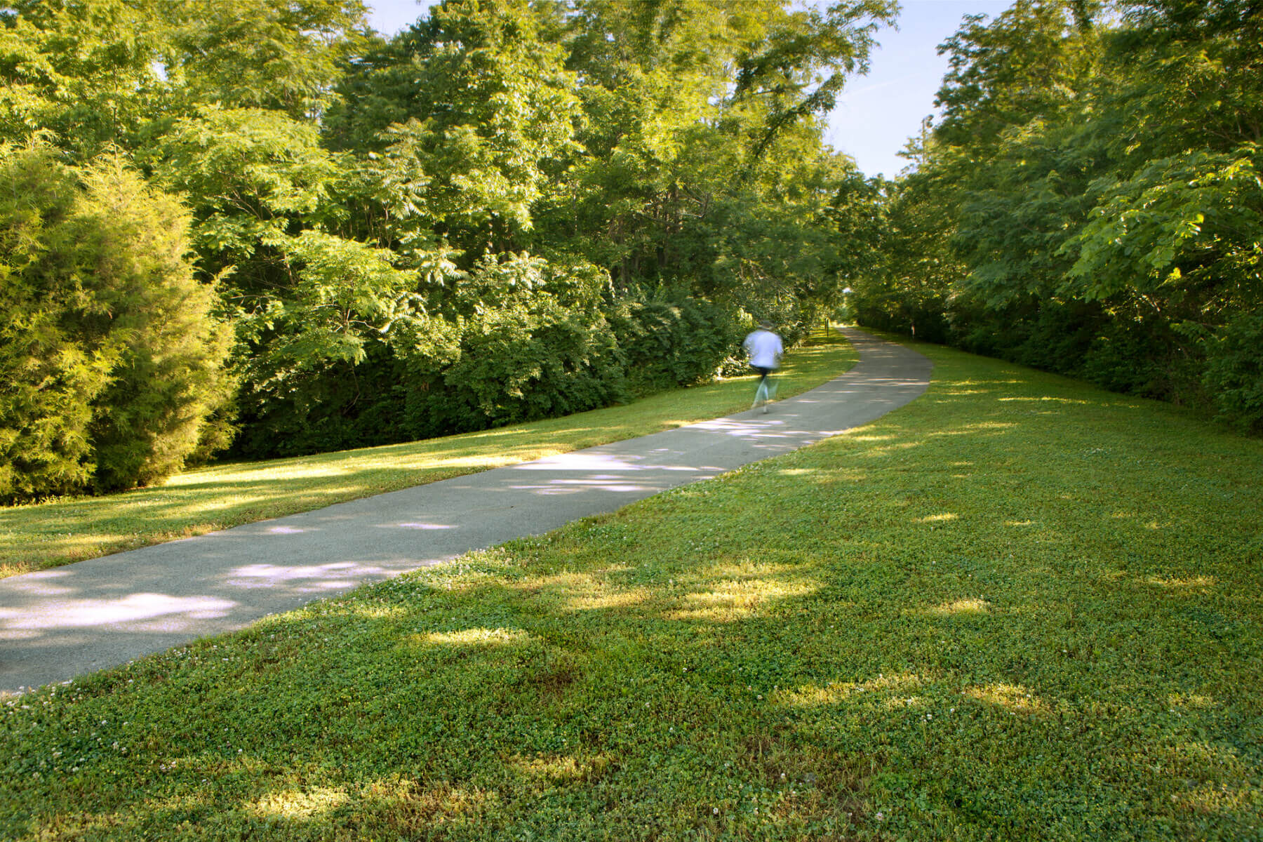 a runner on a trail at the Williamson County Soccer Complex