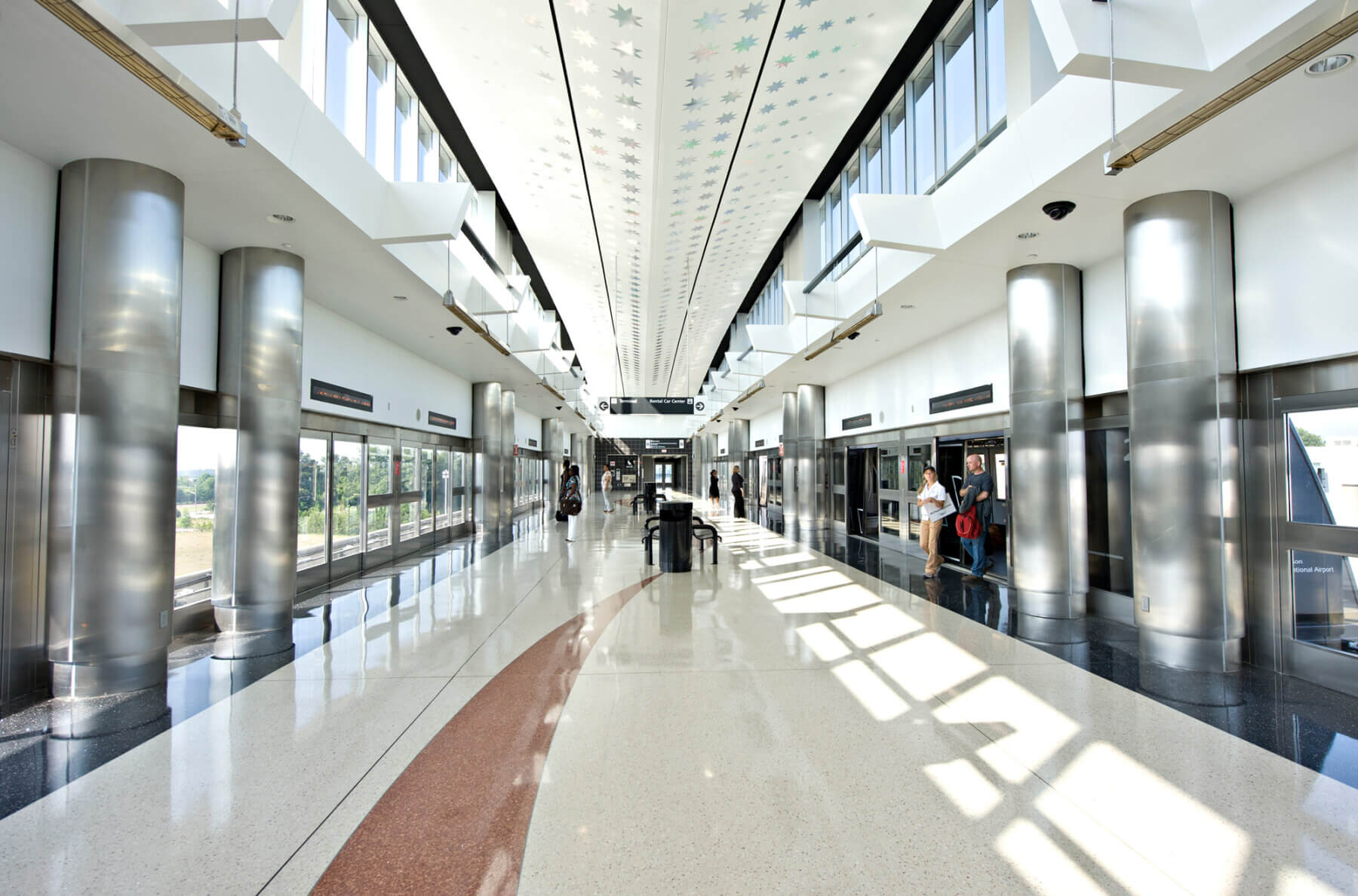 the inside of an automated people mover station at Hartsfield-Jackson Atlanta International Airport