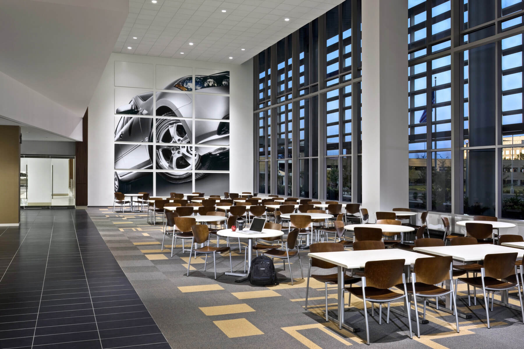 a large area with tables in the Nissan North America Headquarters in Franklin, TN
