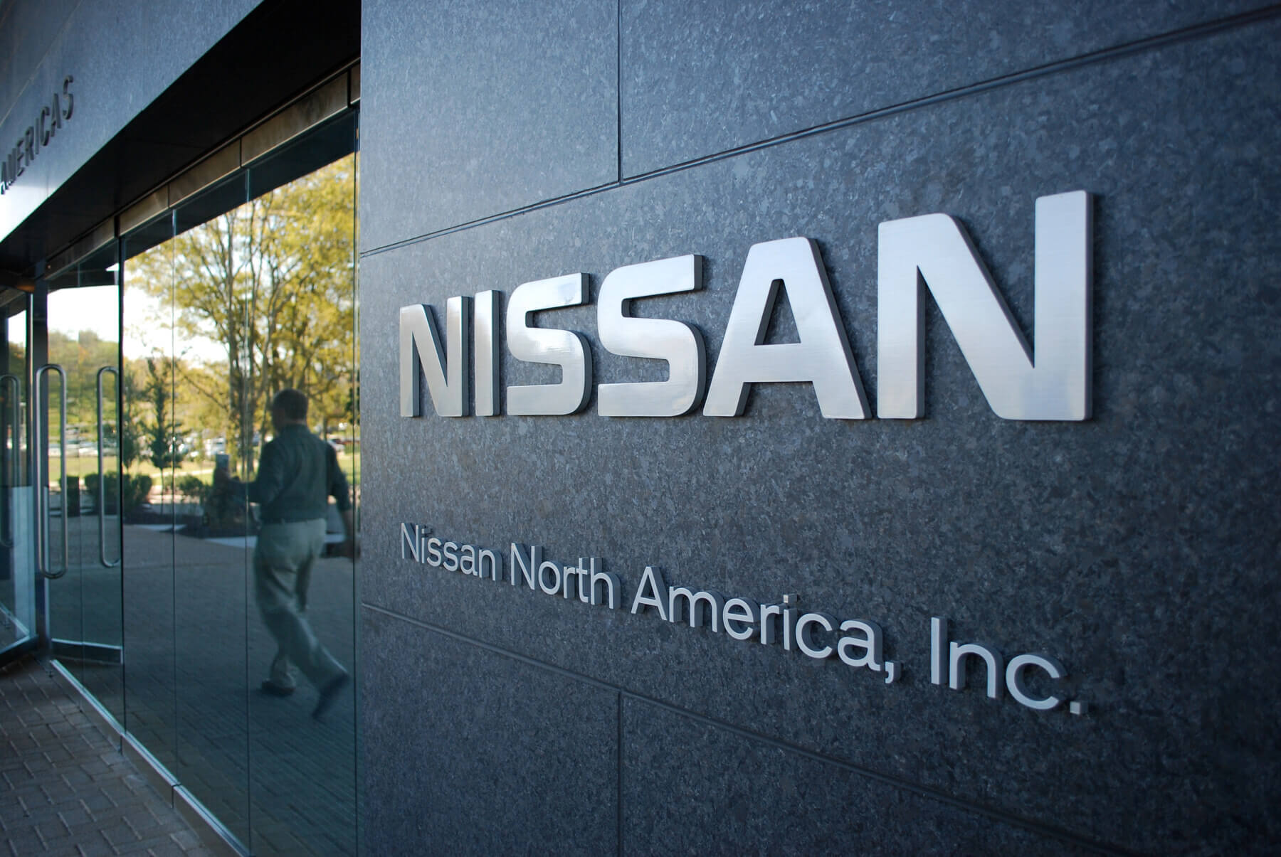 a exterior branding sign at the Nissan North America Headquarters in Franklin, TN