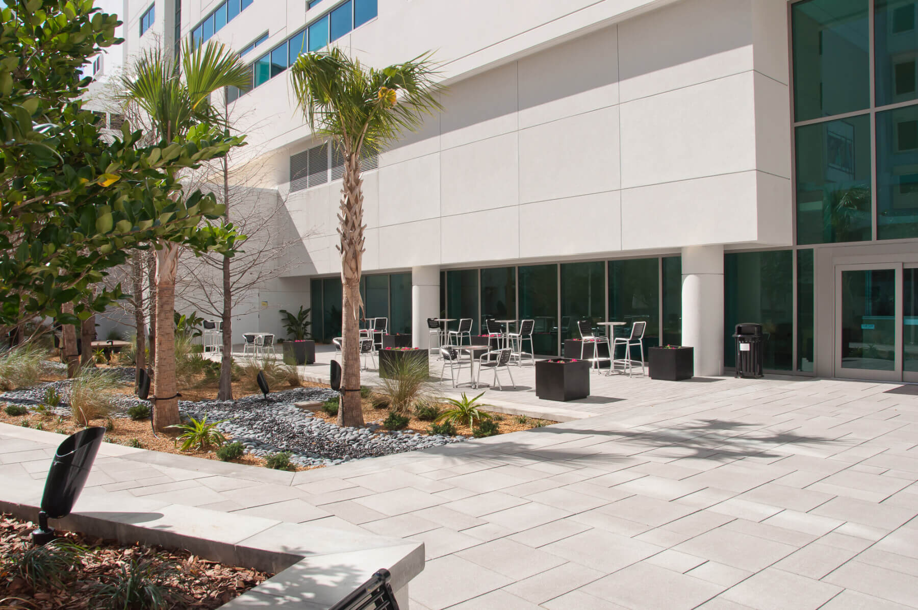a patio with seating outside the inpatient tower at Sarasota Memorial Hospital