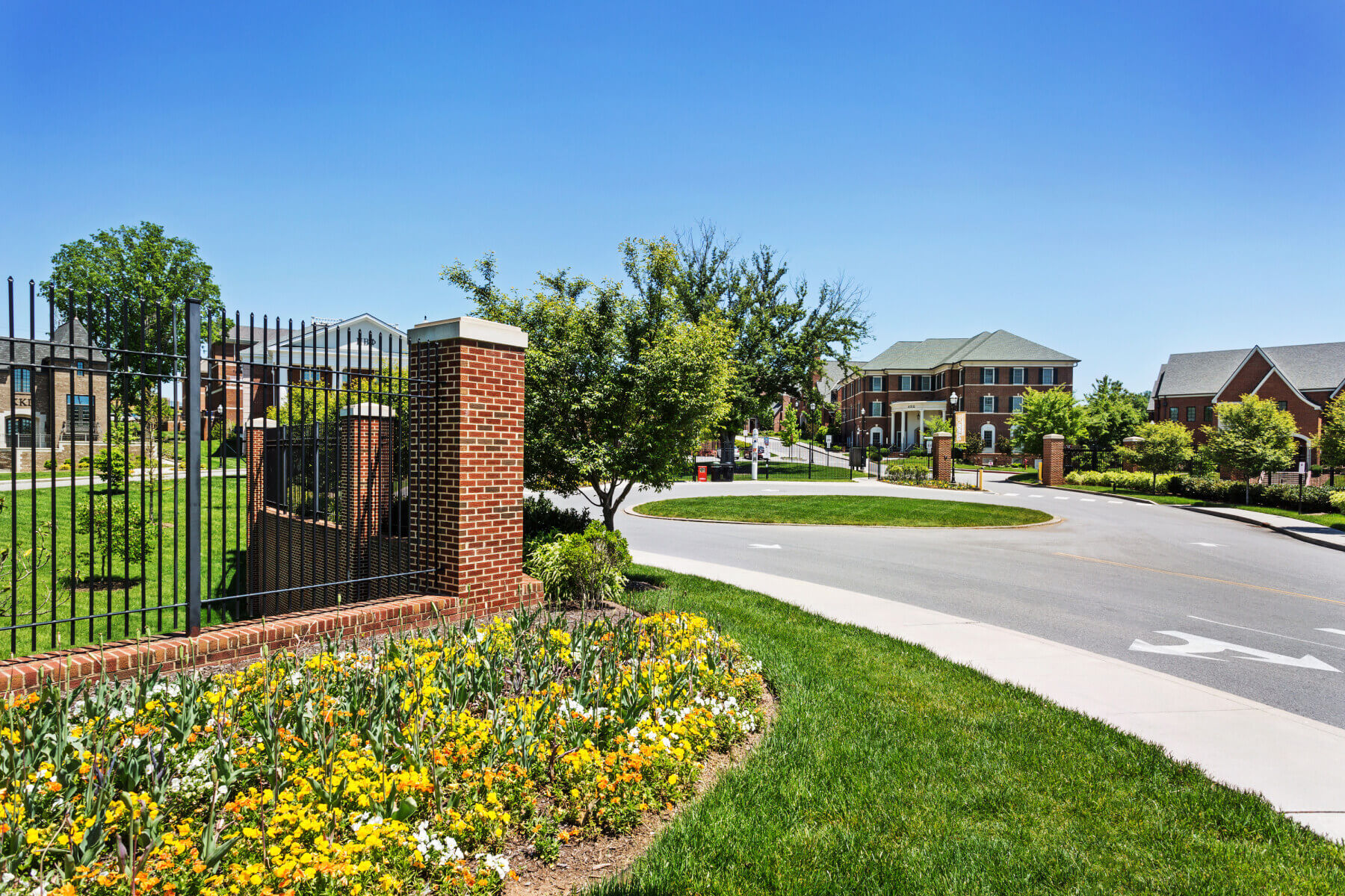 a shot of the entrance with flowers at the University of Tennessee’s Sorority Housing site