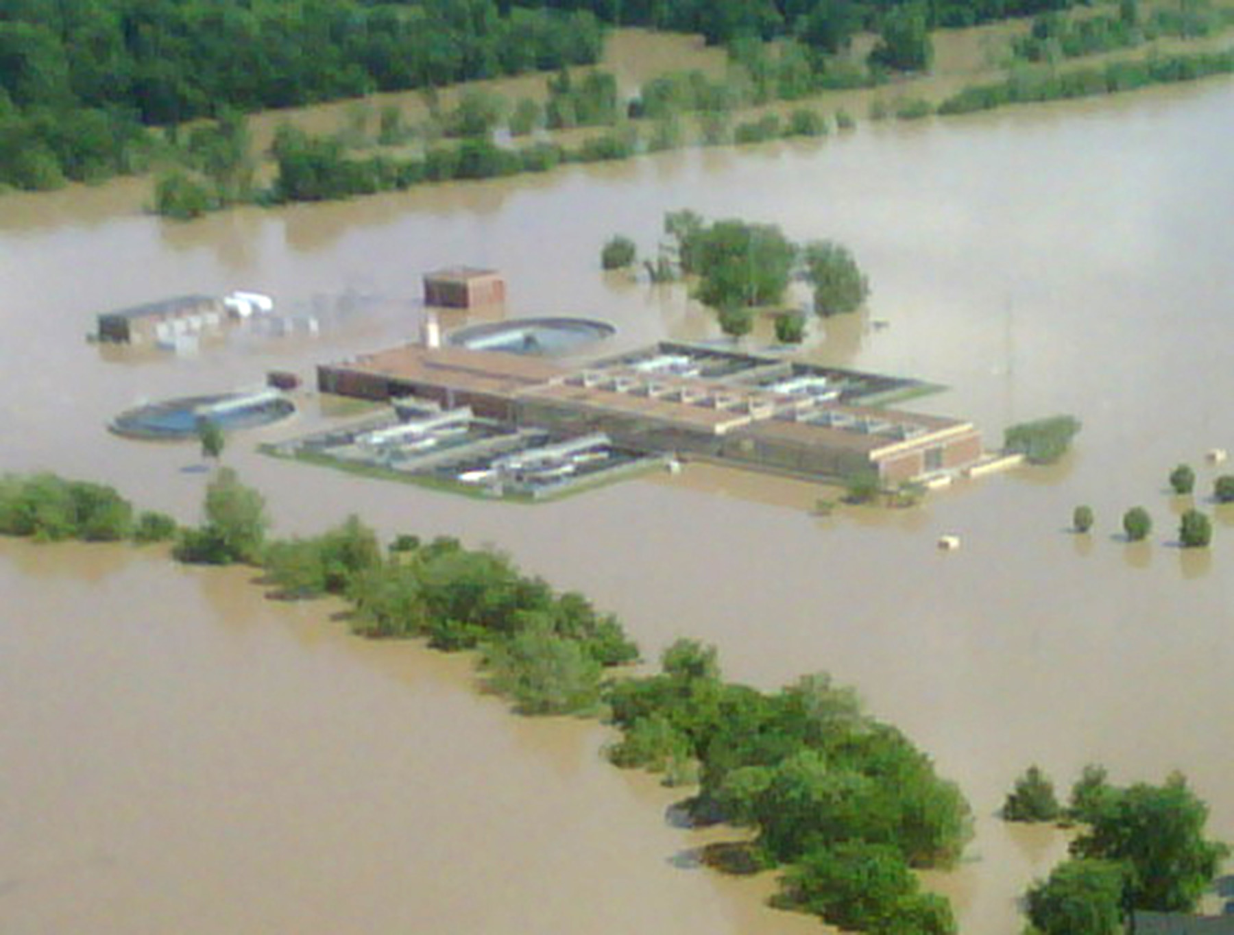 Aerial view of K.R. Harrington Water Treatment Plant and surrounding area overcome by floodwaters.