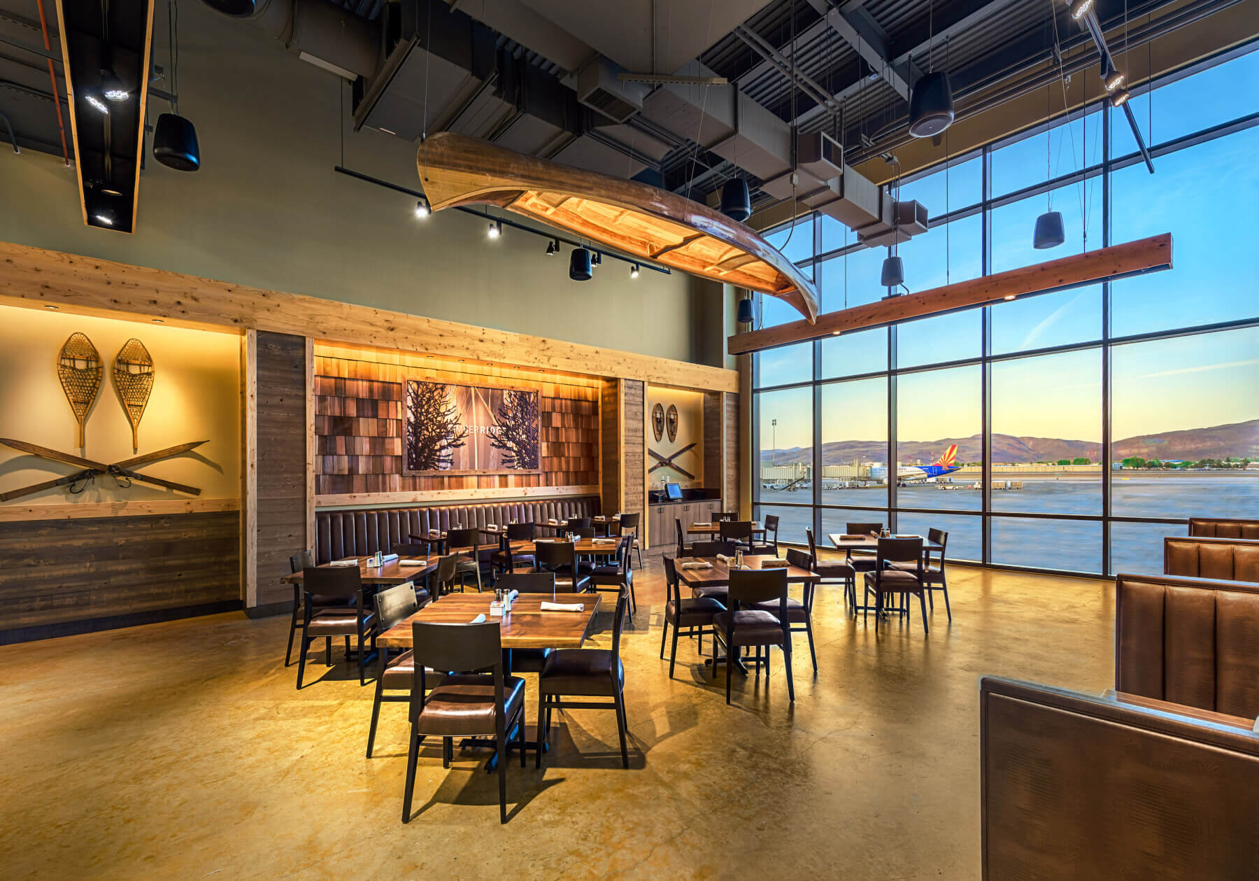 a restaurant with a view of the airfield inside Reno Tahoe International Airport