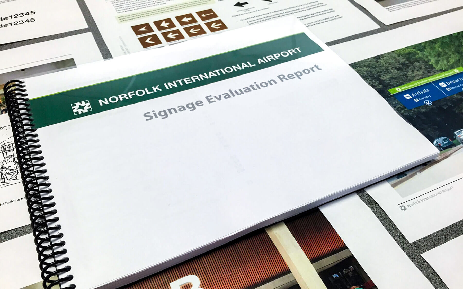 pages from the signage evaluation report for Norfolk International Airport