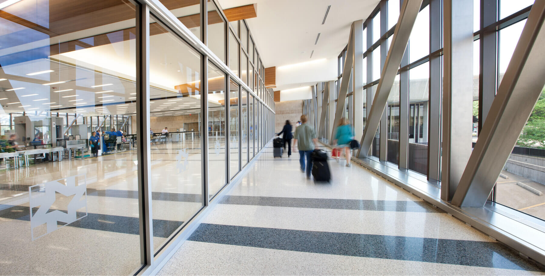 passengers walking down the corridor to security screening at Norfolk International Airport