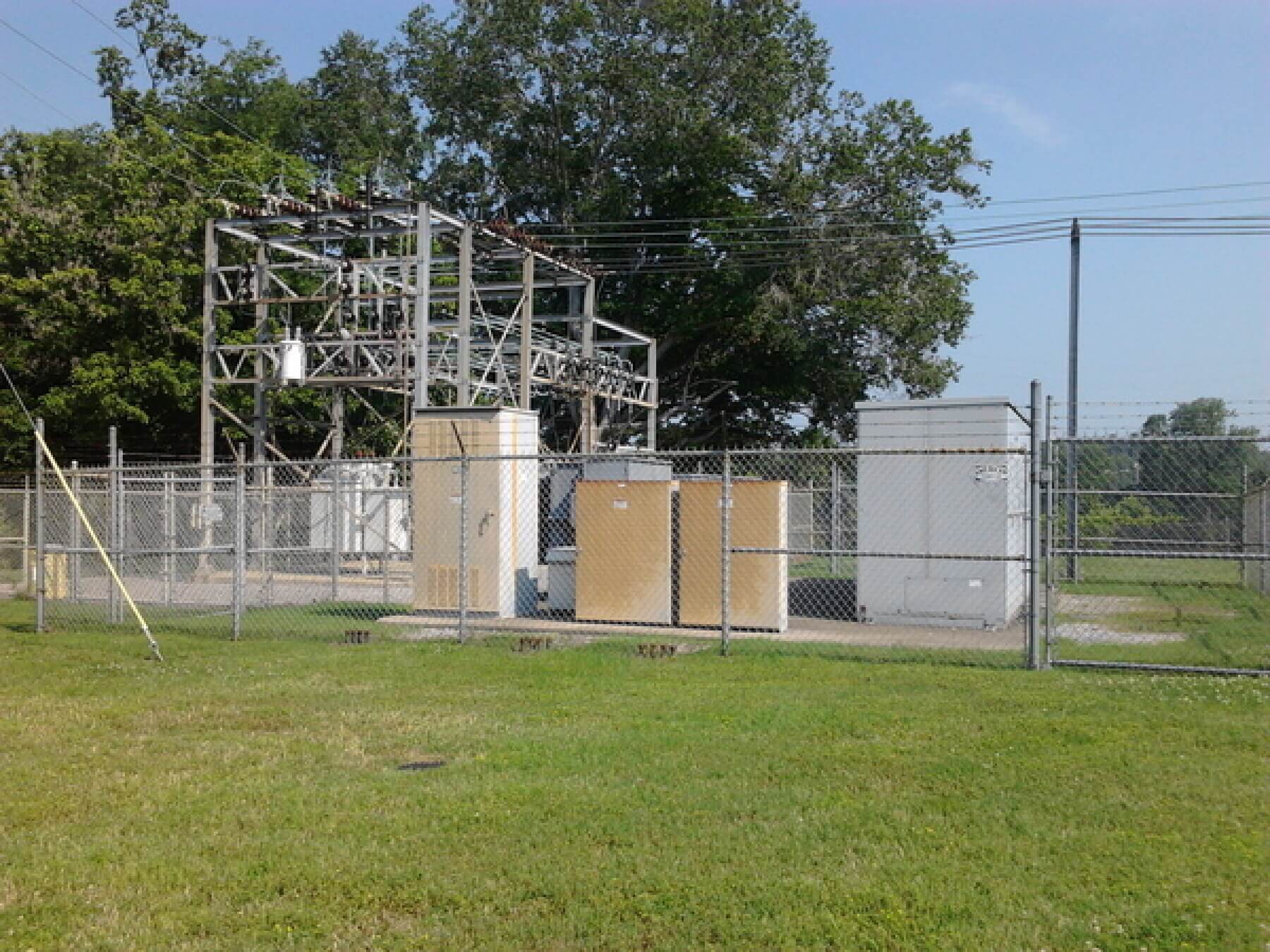Fenced off area with power generators.