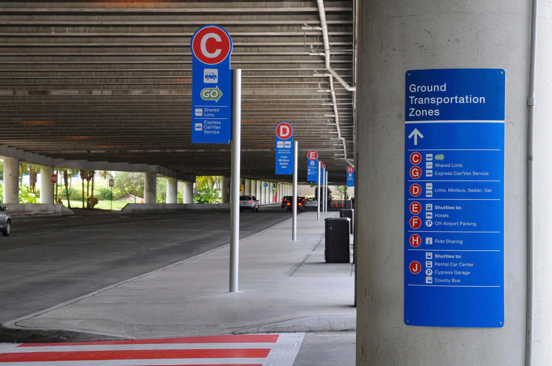 signage for ground transportation on the curbside at Fort Lauderdale-Hollywood International Airport