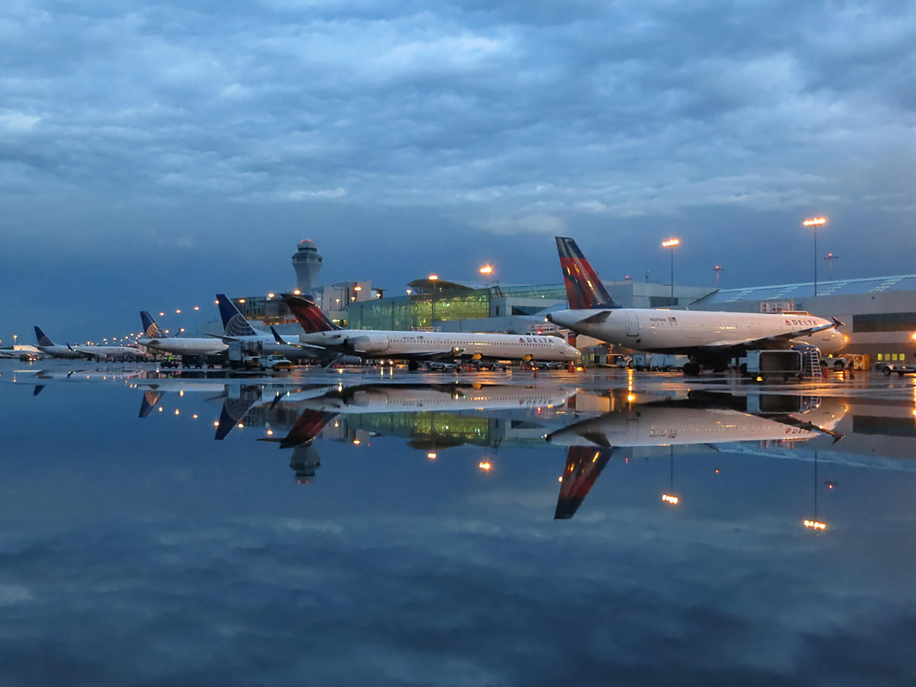 Planes wait at gate at Portland International Airport