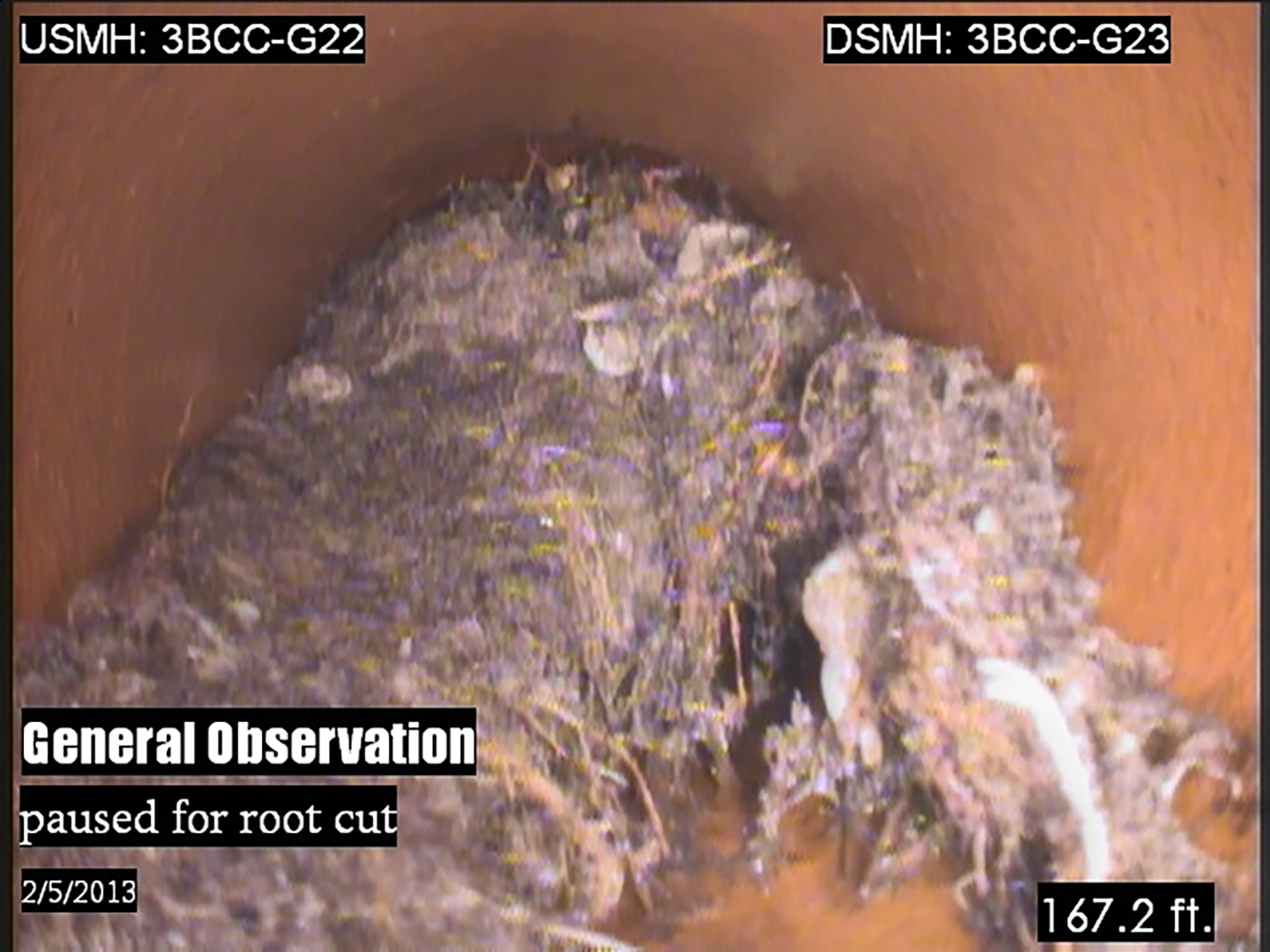 Image of inside the sewer from a closed-circuit TV video.