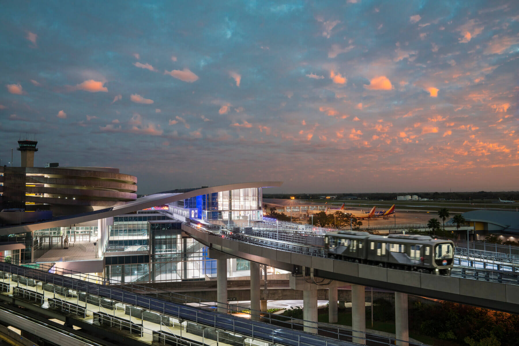 the automated people mover at Tampa International Airport at dusk