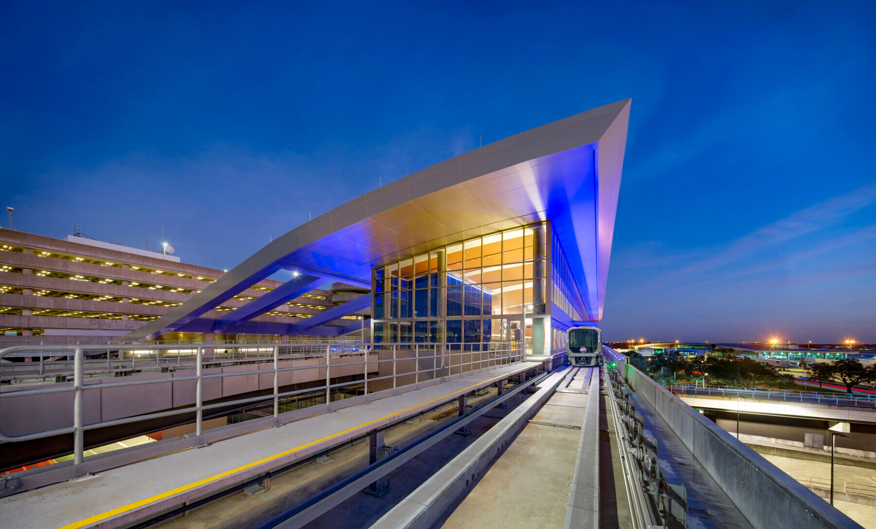 the automated people mover at Tampa International Airport at night