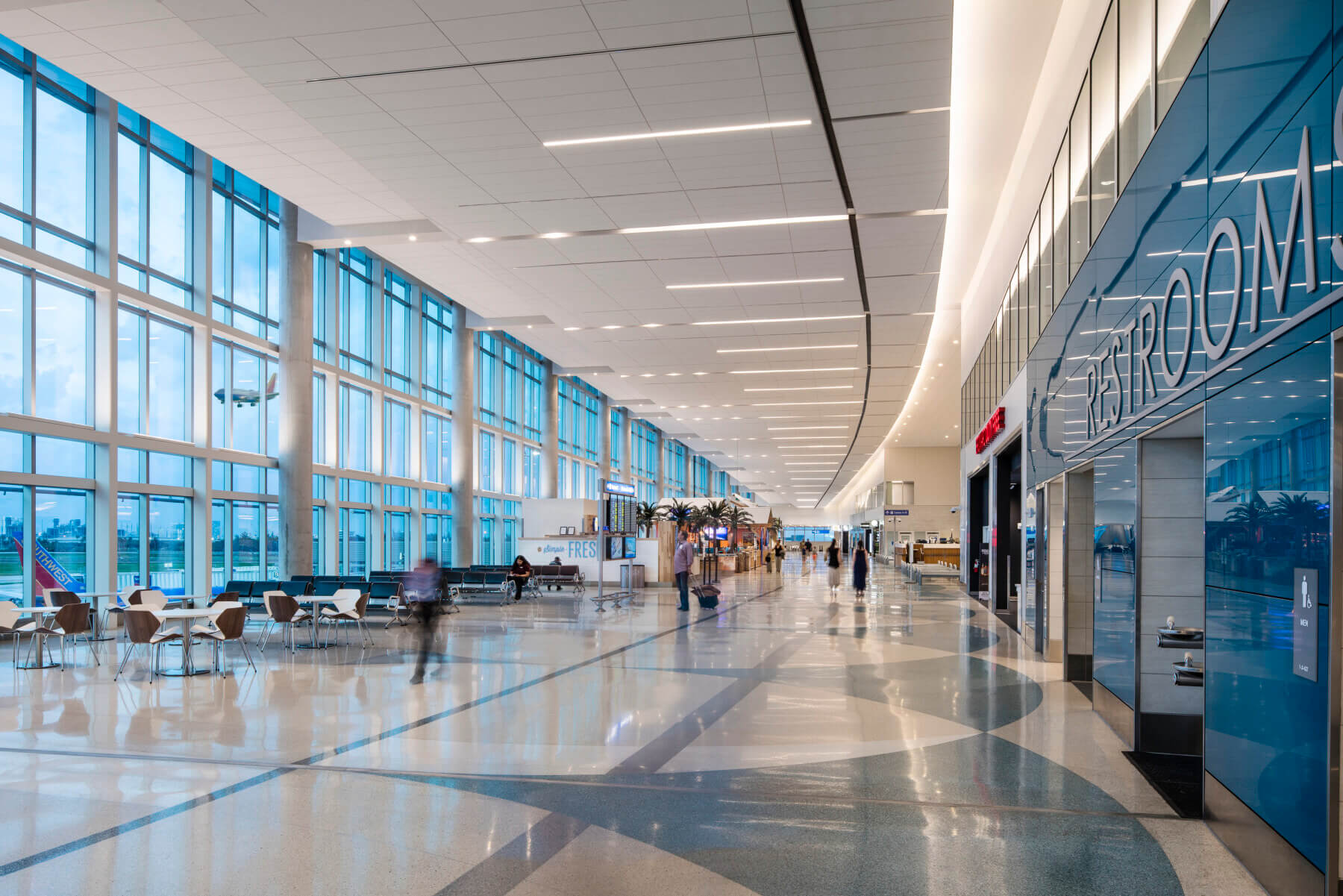 concourse with large windows and view or airfield in Terminal 1 at Fort Lauderdale-Hollywood International Airport