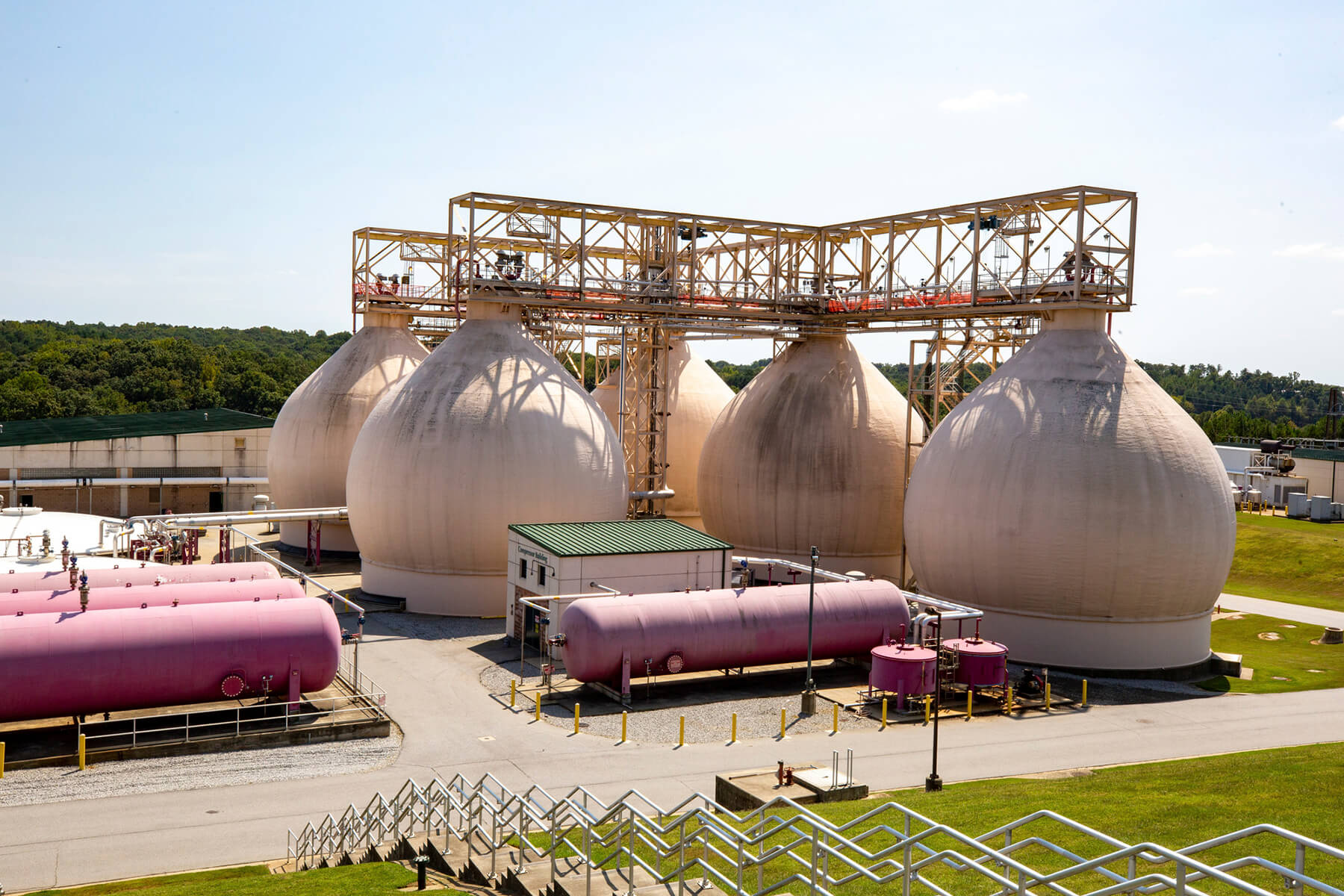 Anaerobic digesters stand prominently at F. Wayne Hill Water Resources Center