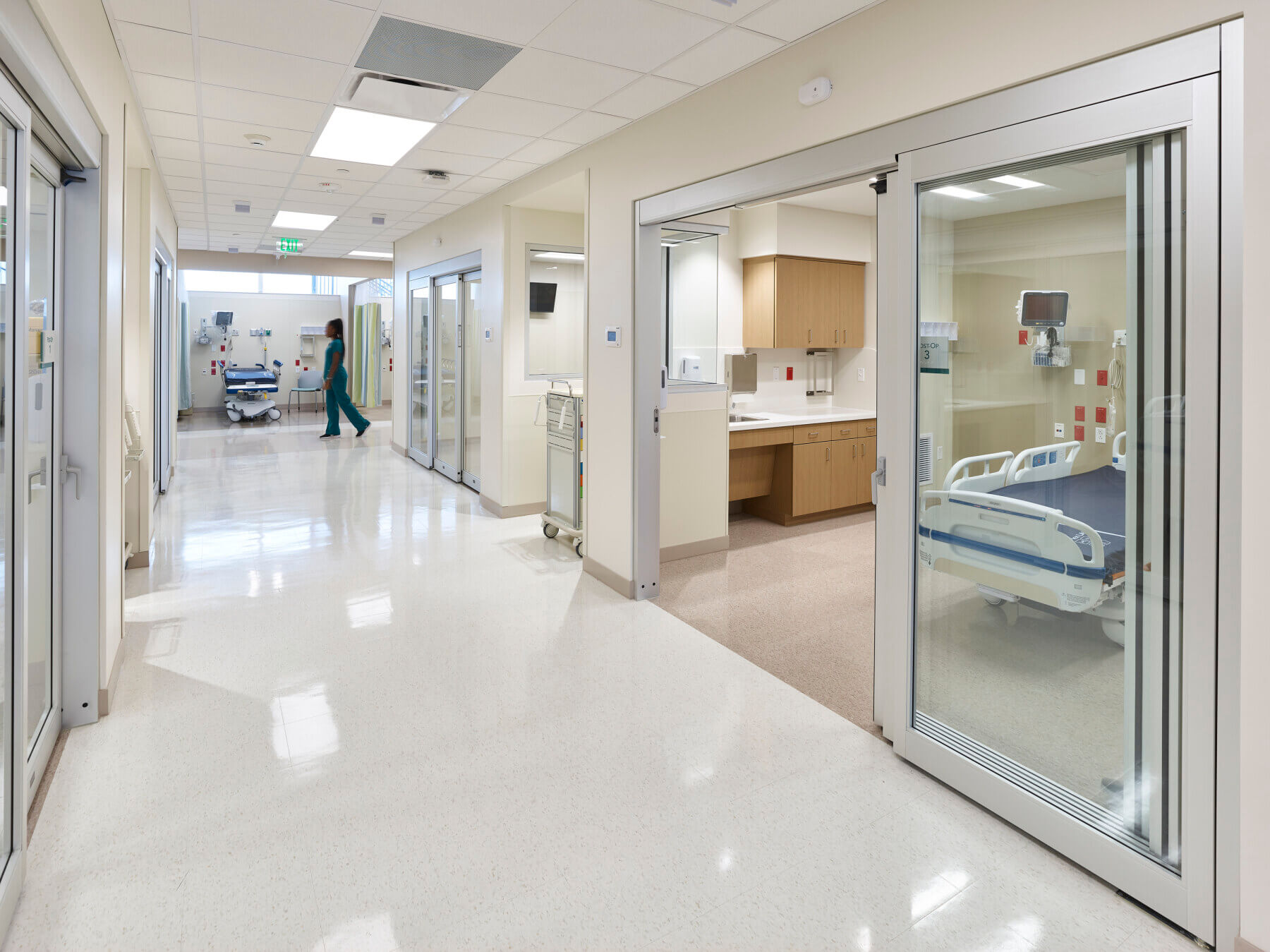 corridor with patient rooms