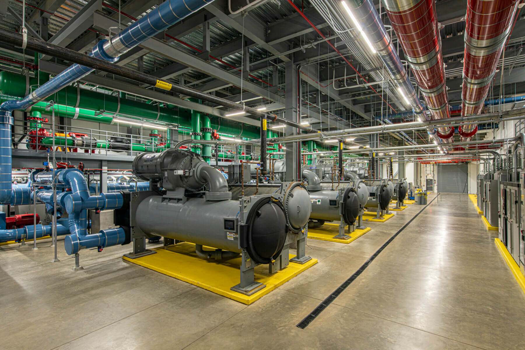 mechanical equipment inside the central energy plant at Charlotte Douglas International Airport