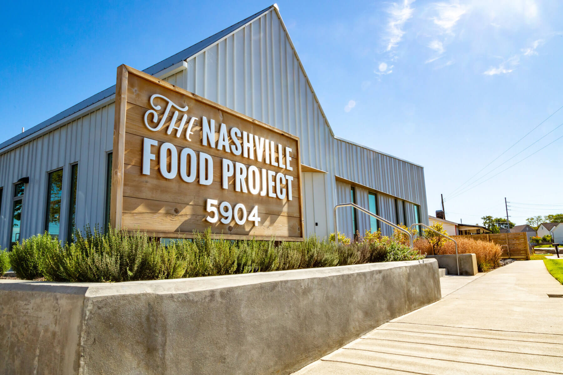 The exterior of the Nashville Food Project with large branded sign