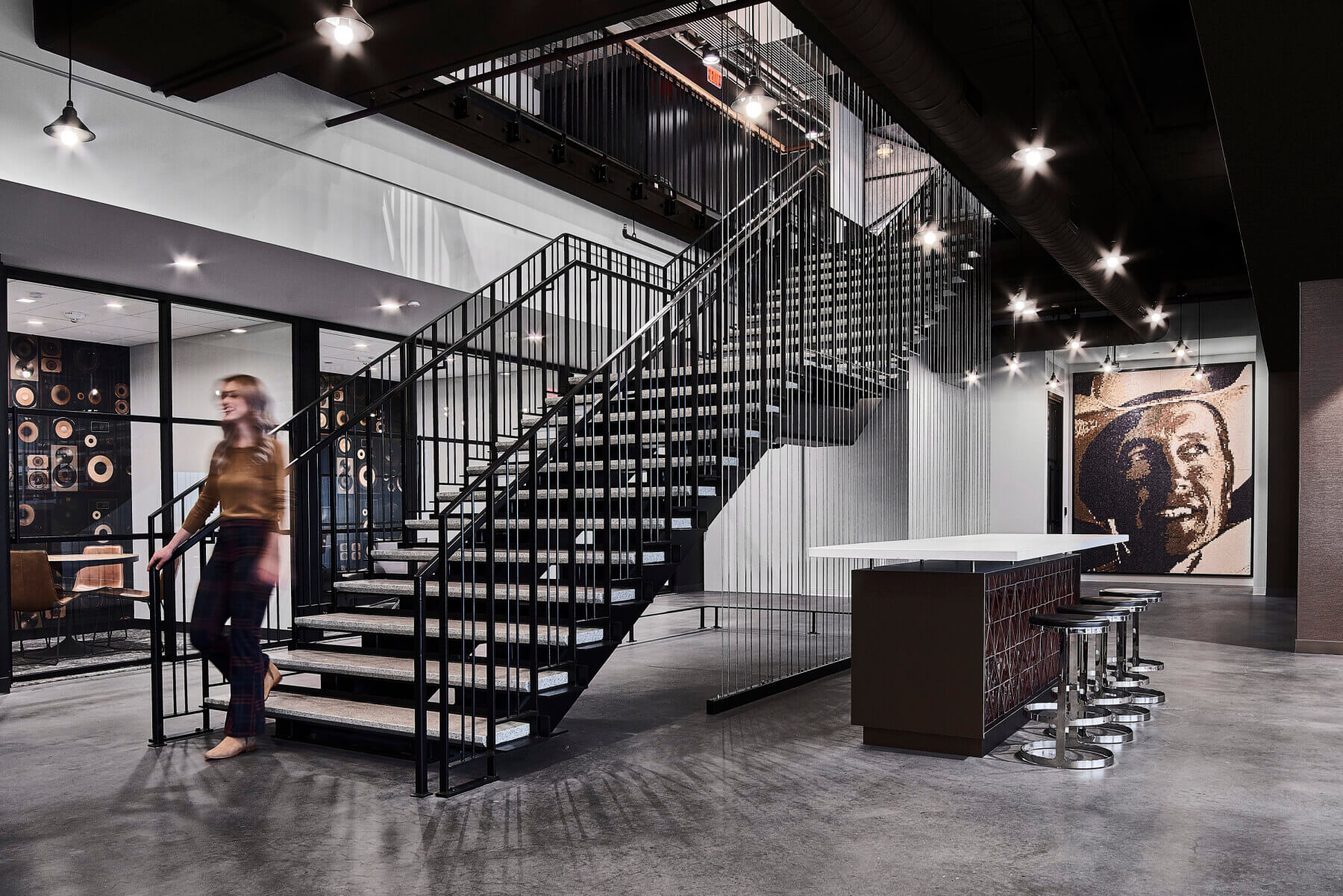 The main stairs and a bar in the Universal Music Group Nashville offices