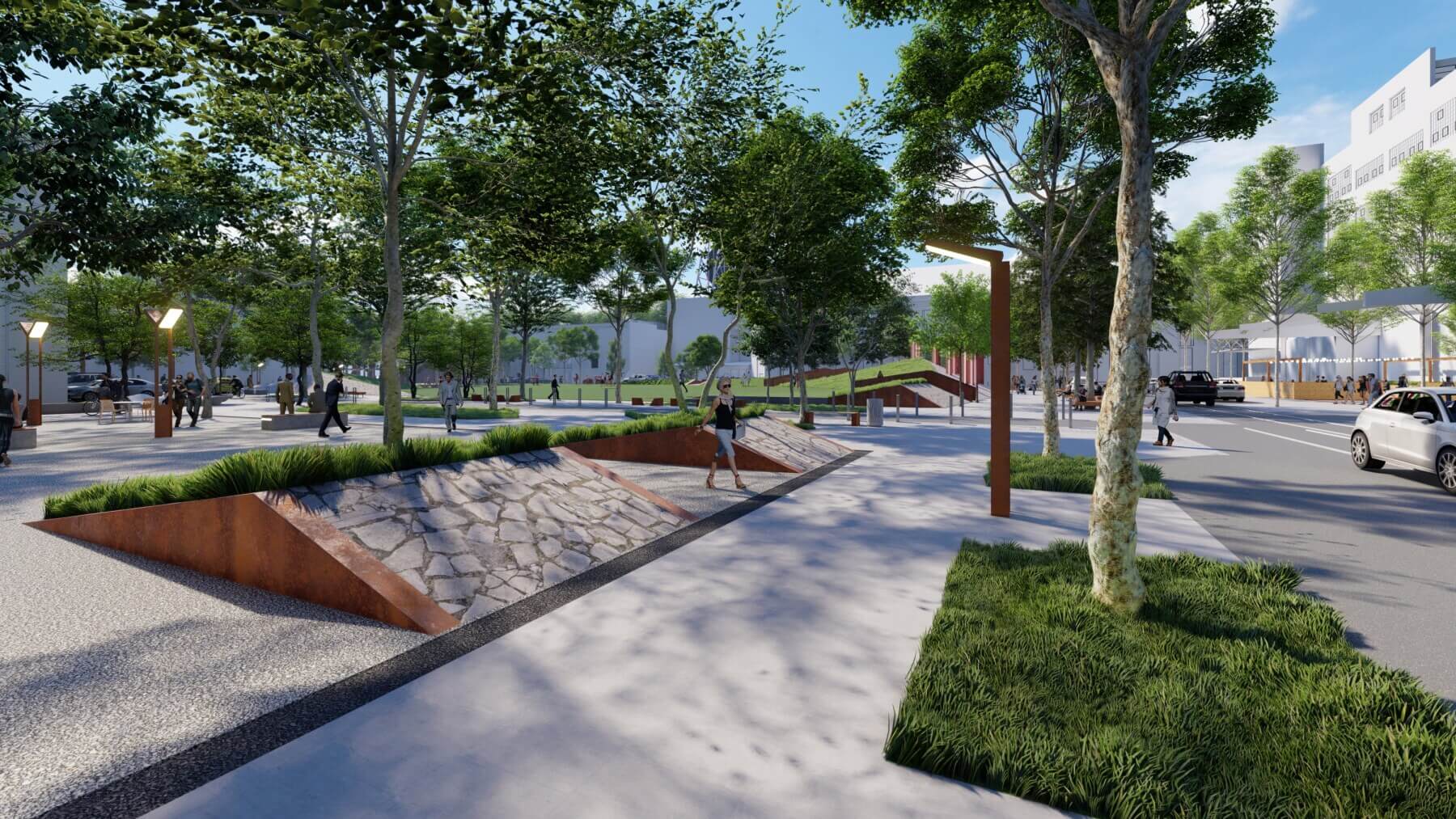 A sidewalk lined with trees and rocks at the Clark’s Landing Conceptual Master Plan Study