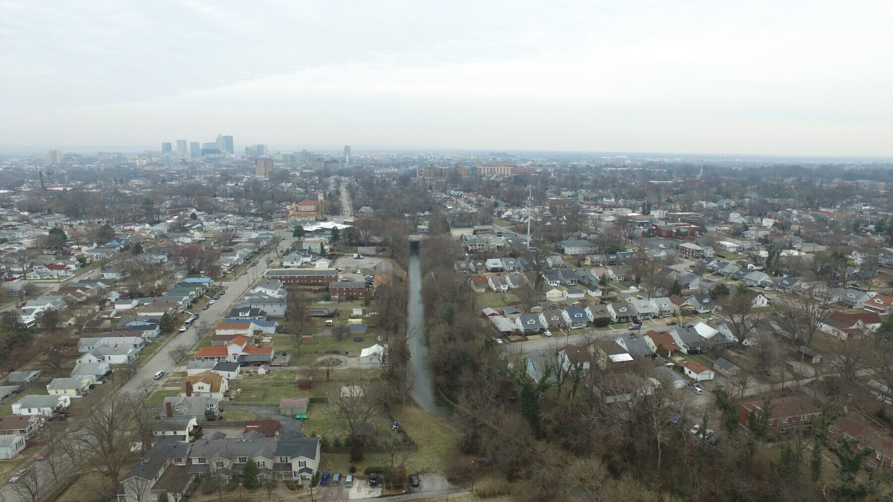 aerial view of Beargrass Creek running through neighborhoods in Louisville, Kentucky