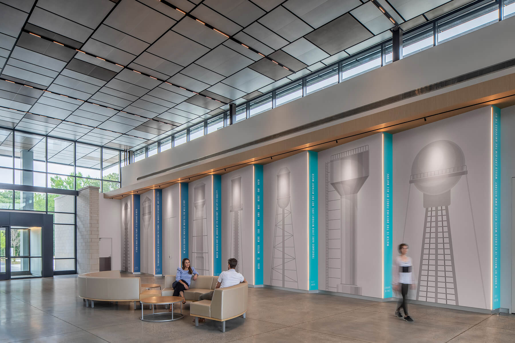 Lobby area of The Water Tower Global Innovation Hub featuring water tower renderings