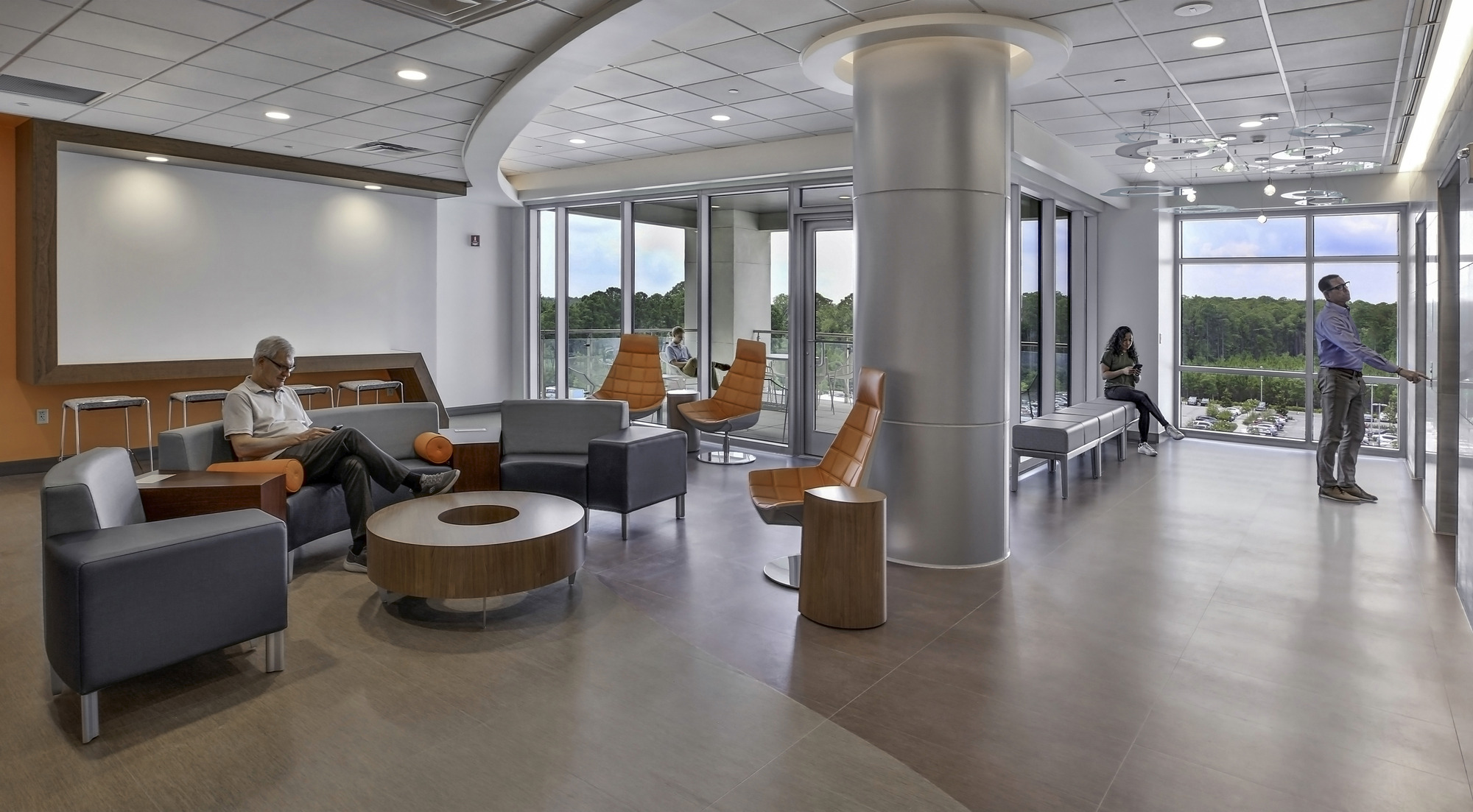 People sitting in a waiting area in a hospital