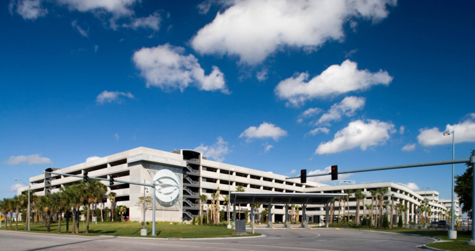 the exterior of the economy parking garage at Tampa International Airport from across the street