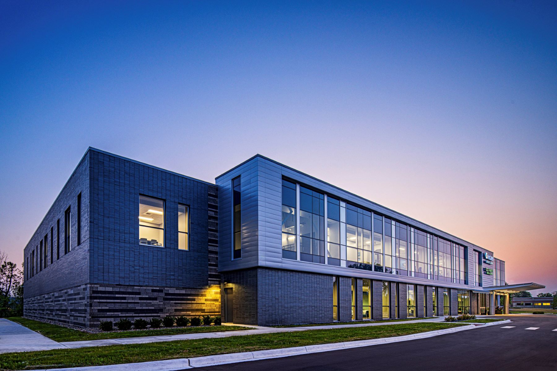 exterior of a two-story medical office building at dusk