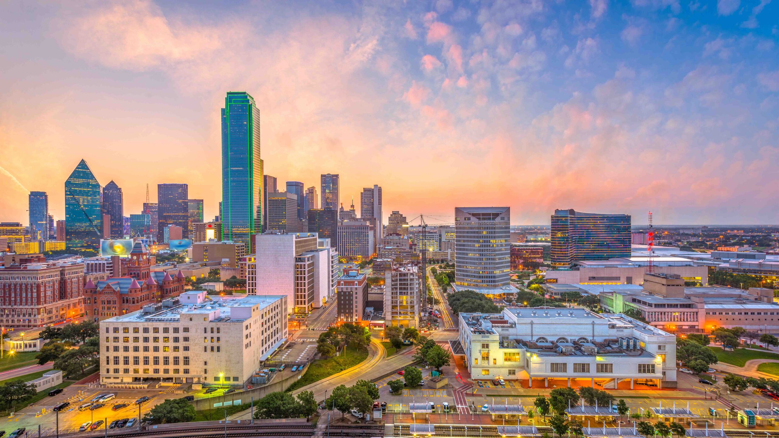 Dallas, Texas, USA downtown city skyline at dusk.