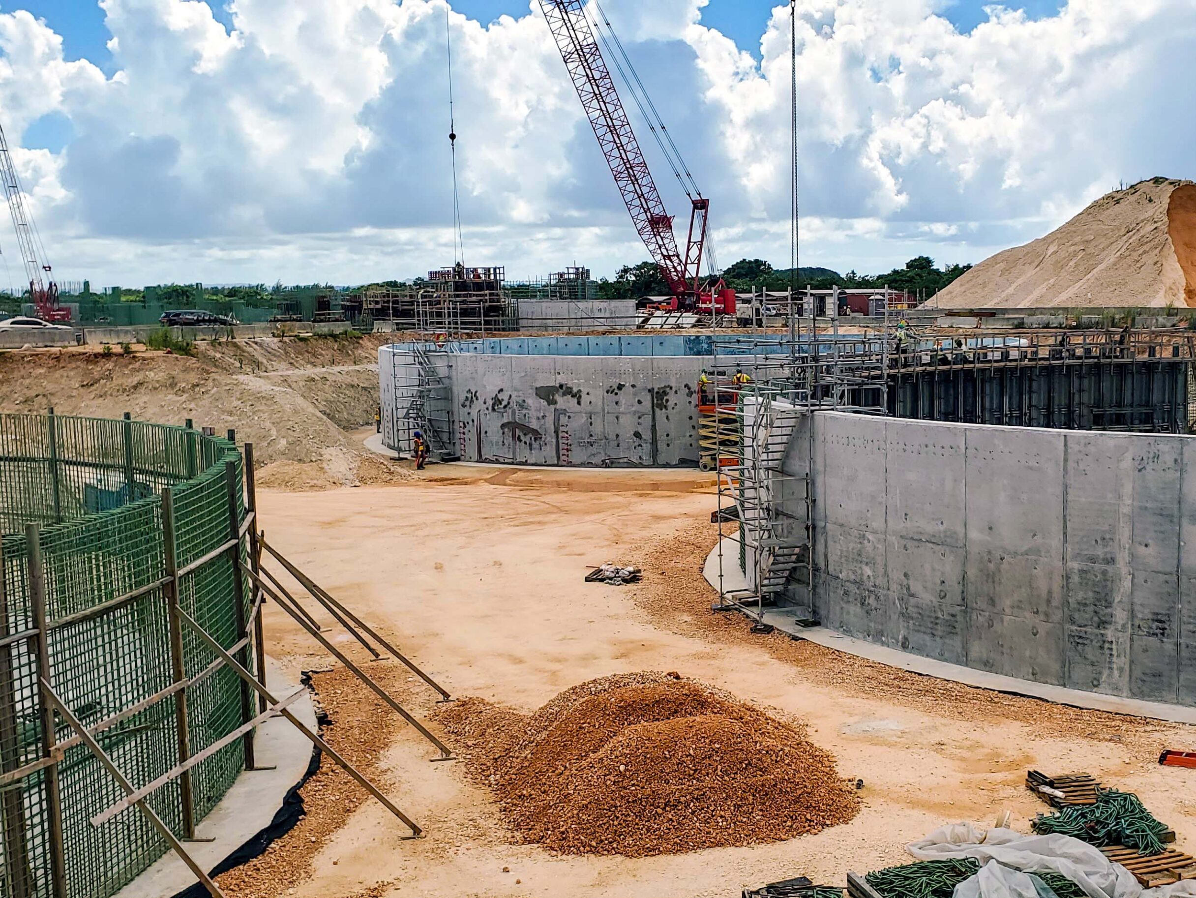 three clarifiers under construction at a wastewater treatment plant