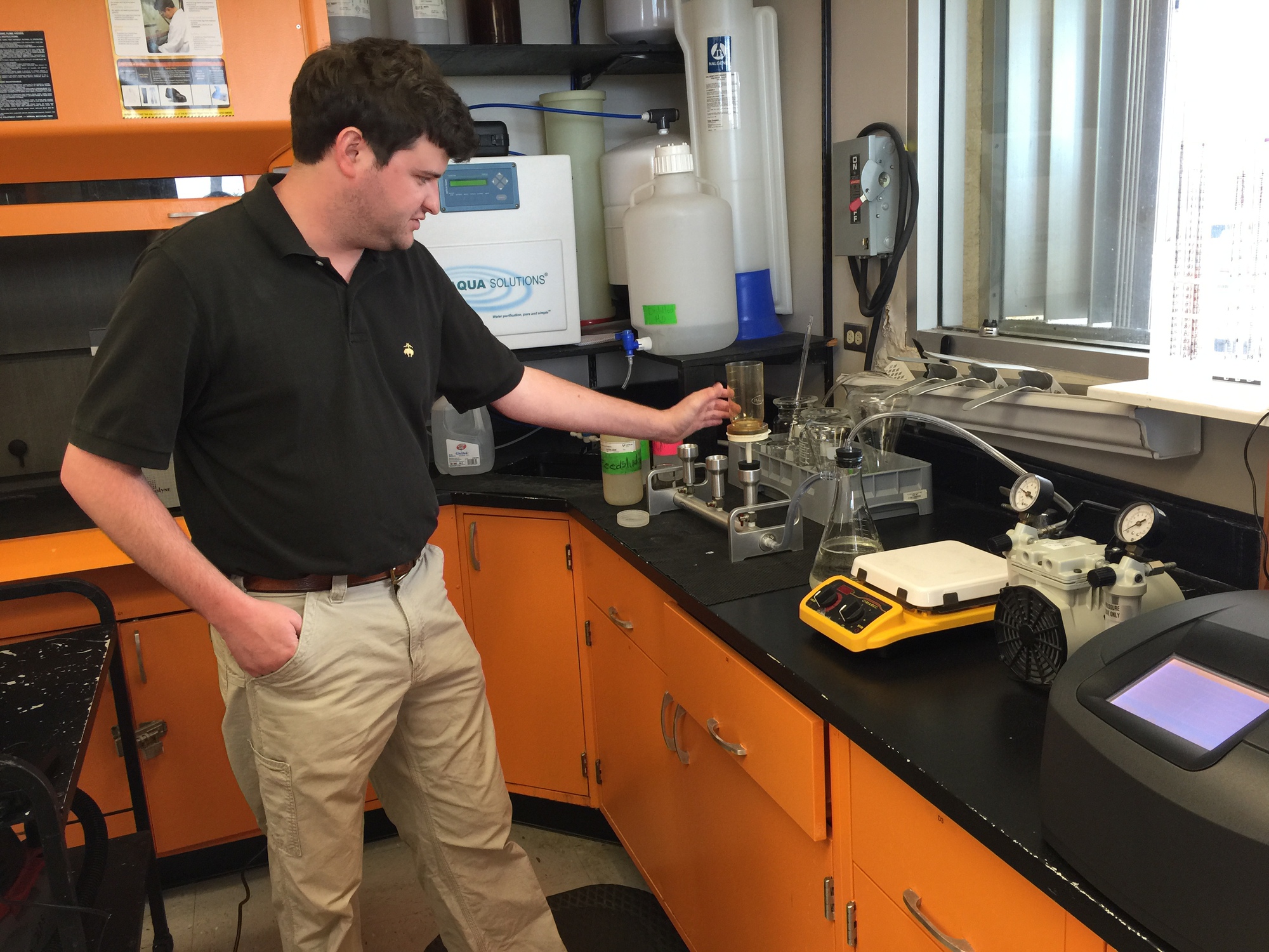 an engineer in a lab conducting wastewater modeling