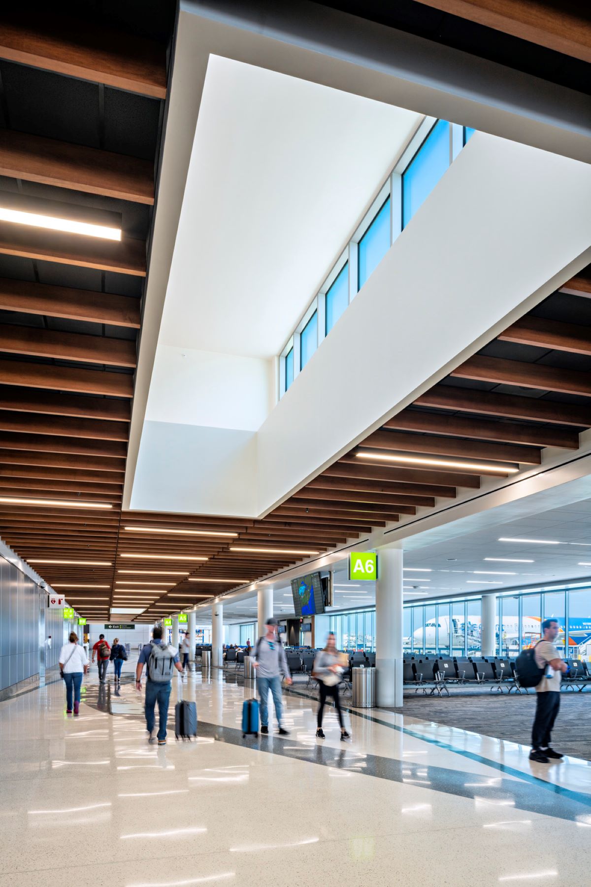 people walking through concourse at at sarasota bradenton international airport