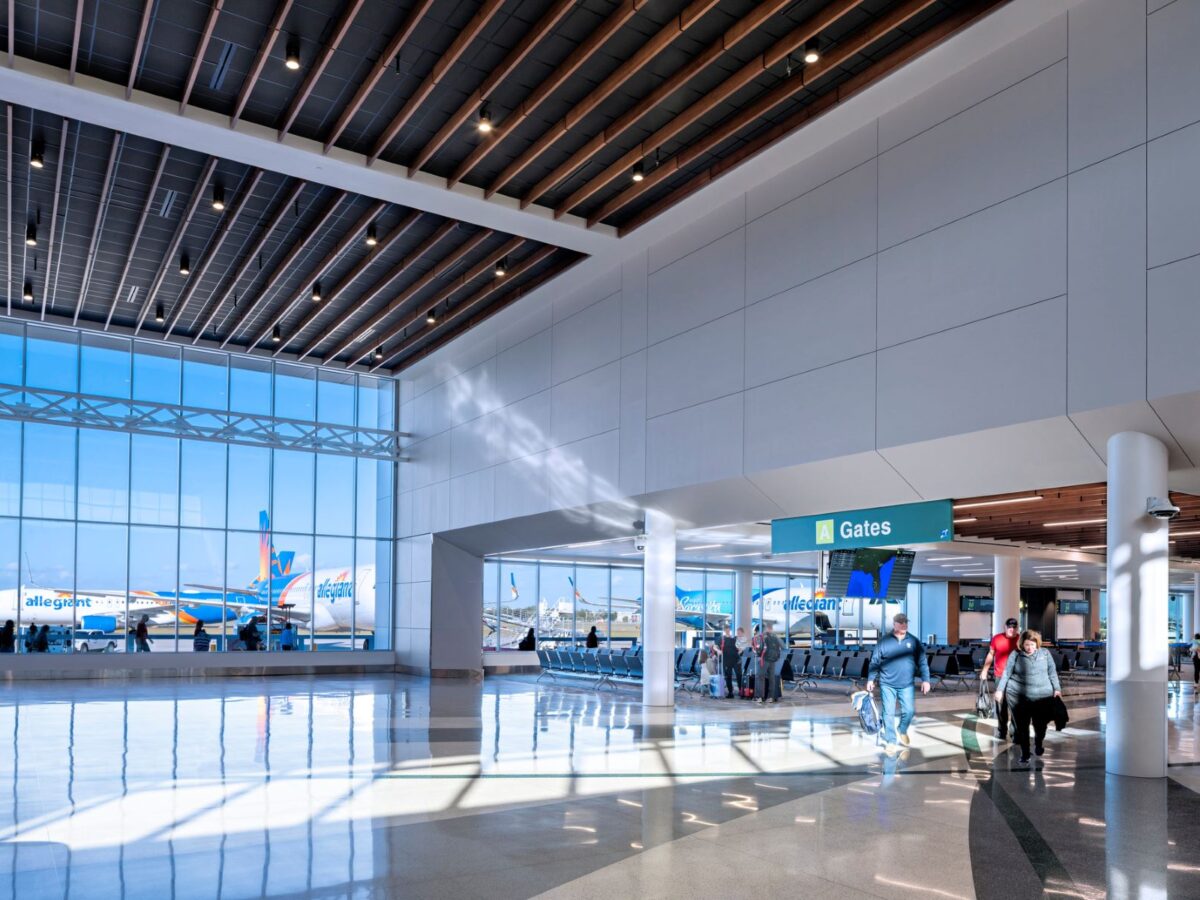 two-story connector hall with large windows at sarasota bradenton international airport