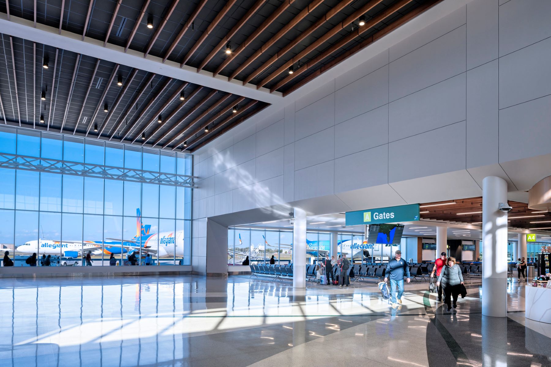 two-story connector hall with large windows at sarasota bradenton international airport