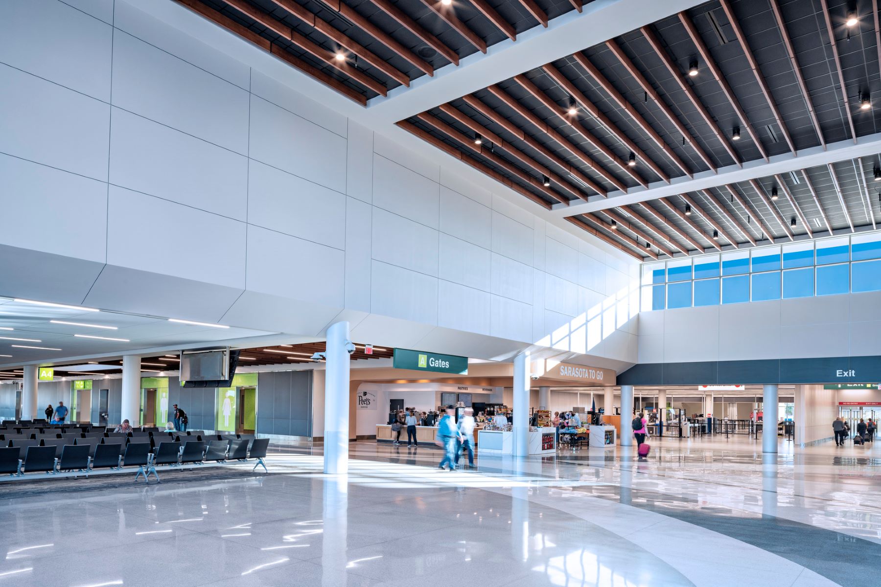 two-story connector hall with wood ceiling at sarasota bradenton international airport